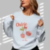 Cherie sweatshirt with cherry design on Gildan 18000 - Light Blue