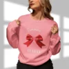 Feminine & Flirty sweatshirt with red satin bow design on Gildan 18000 - Safety Pink