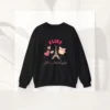 Flirt Like a French Girl sweatshirt with Eiffel Tower and macron design on Gildan 18000 - Black Flatlay