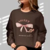 Sweet But Never Subtle bow sweatshirt with pink bow and heels Gildan 18000 crewneck - Dark Chocolate