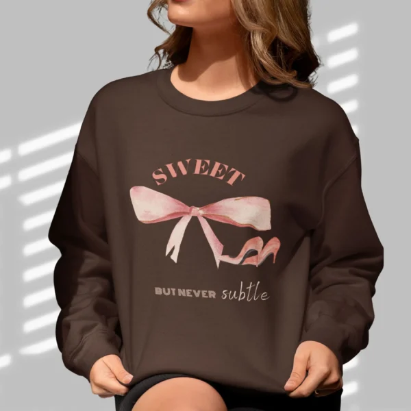 Sweet But Never Subtle bow sweatshirt with pink bow and heels Gildan 18000 crewneck - Dark Chocolate