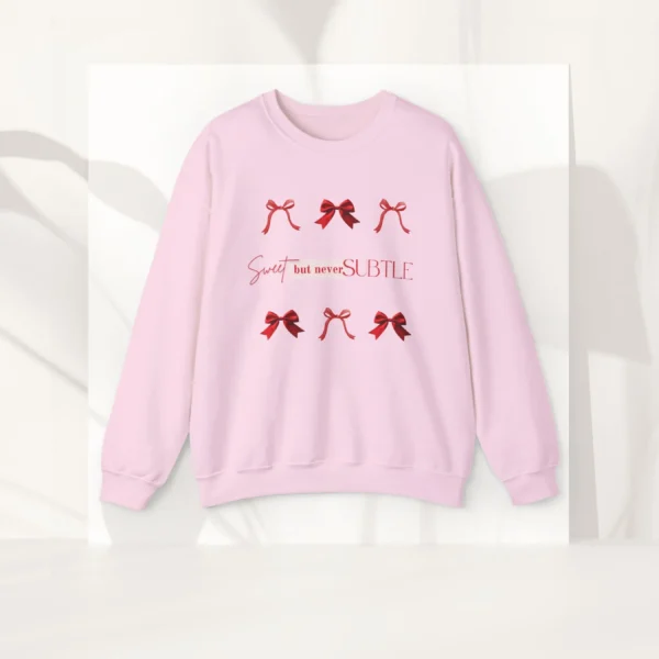 Sweet but never subtle sweatshirt with bow design on Gildan 18000 - Light Pink Flatlay