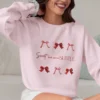 Sweet but never subtle sweatshirt with bow design on Gildan 18000 - Light Pink