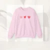 Three Hearts sweatshirt with red hearts design on Gildan 18000 - Light Pink Flatlay