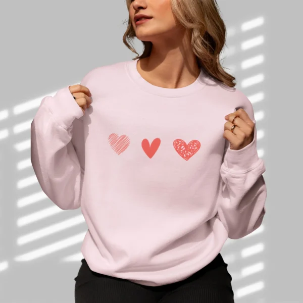 Three Hearts sweatshirt with red hearts design on Gildan 18000 - Light Pink
