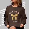 Tied with grace sweatshirt with bow and lipstick design on Gildan 18000 - Dark Chocolate