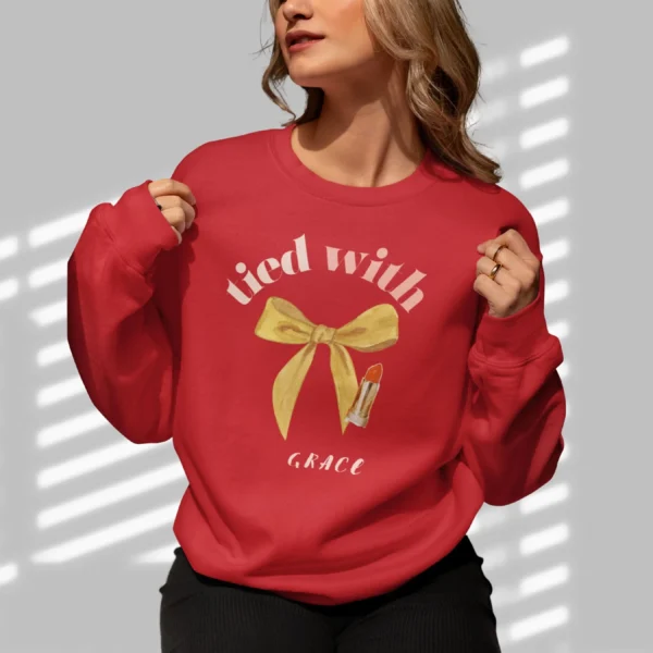 Tied with grace sweatshirt with bow and lipstick design on Gildan 18000 - Cherry Red