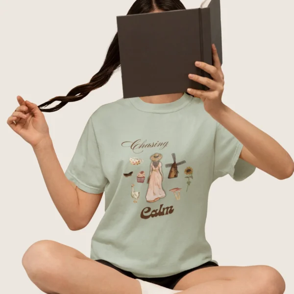Chasing Calm Tee with cottage girl, geese, florals, and windmill on Comfort Colors 1717 - Bay