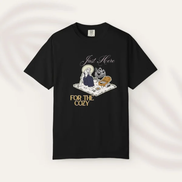 Just Here for the Cozy Tee 1717 with illustration of a girl enjoying picnic on Comfort Colors 1717 - Black Flatlay