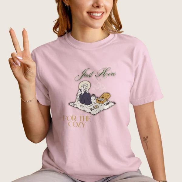 Just Here for the Cozy Tee 1717 with illustration of a girl enjoying picnic on Comfort Colors 1717 - Blossom