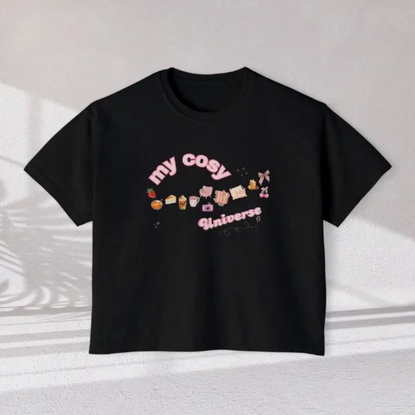 My Cozy Universe Tee with books, candle, couch, bow design on CC3023 - Black Flatlay
