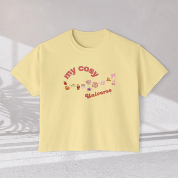 My Cozy Universe Tee with books, candle, couch, bow design on CC3023 - Butter Flatlay