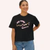 My Cozy Universe Tee with books, candle, couch, bow design on CC3023 - Black