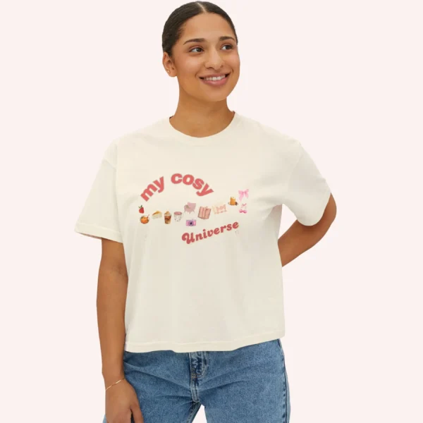 My Cozy Universe Tee with books, candle, couch, bow design on CC3023 - Ivory