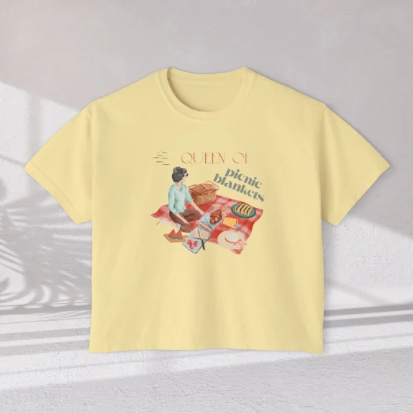Queen of Picnic Blankets Tee with picnic girl illustration on Comfort Colors 3023 - Butter Flatlay