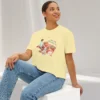Queen of Picnic Blankets Tee with picnic girl illustration on Comfort Colors 3023 - Butter Sitting