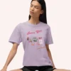 Graphic T-shirt with "Retro Girl" text in pink, paired with disco ball, lipstick, purse, martini glass, and cassette on Comfort color 1717 - Orchid