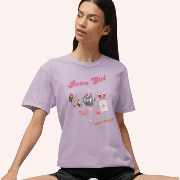 Graphic T-shirt with "Retro Girl" text in pink, paired with disco ball, lipstick, purse, martini glass, and cassette on Comfort color 1717 - Orchid