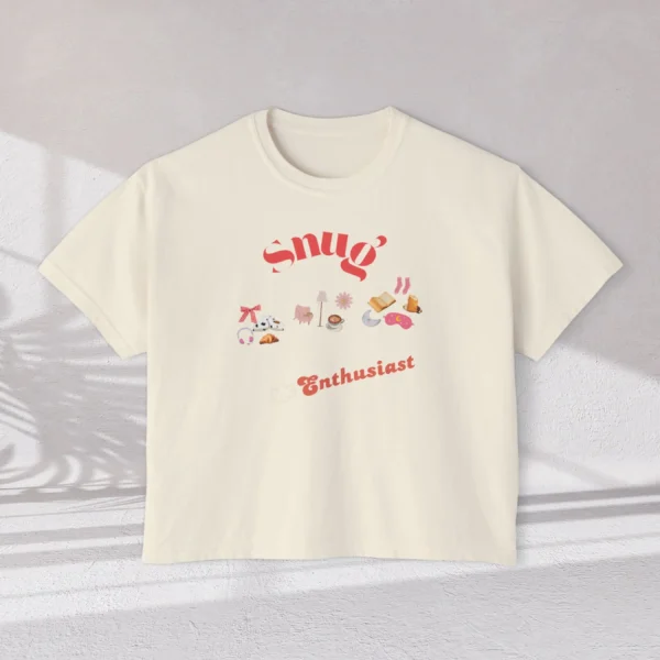 Snug Enthusiast Tee with cozy doodle graphics on Comfort Colors 3023 - Ivory Flatlay