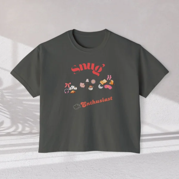 Snug Enthusiast Tee with cozy doodle graphics on Comfort Colors 3023 - Pepper Flatlay