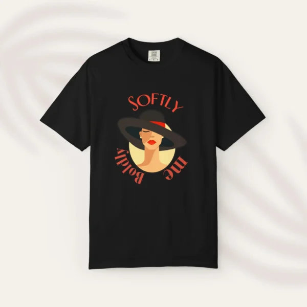 Illustration of a woman in a wide-brim hat with red lipstick and the phrase "Softly Boldly Me" in elegant fonts on Comfort Colors 1717 - Black Flatlay