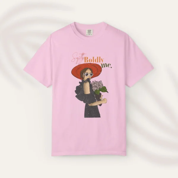 Illustration of a woman in a wide-brim hat with red lipstick and the phrase "Softly Boldly Me" in elegant fonts on Comfort Colors 1717 - Blossom Flatlay