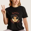 Illustration of a woman in a wide-brim hat with red lipstick and the phrase "Softly Boldly Me" in elegant fonts on Comfort Colors 1717 - Black