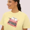 Letters of Love Tee with vintage red typewriter illustration on Comfort Colors 3023 - Butter Closeup