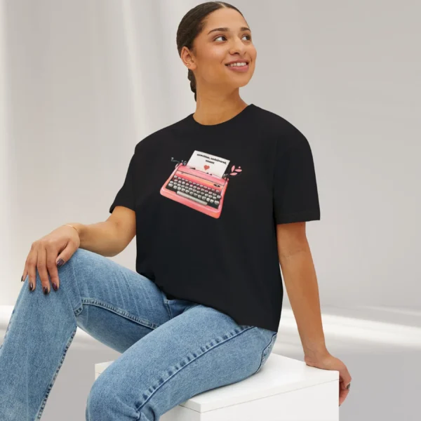 Letters of Love Tee with vintage red typewriter illustration on Comfort Colors 3023 - Black Sitting