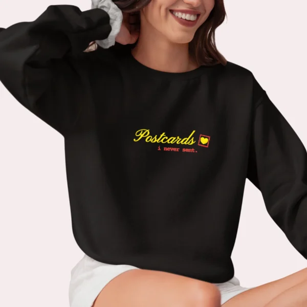 Postcards I Never Sent embroidered Gildan 18000 sweatshirt by Bhoomkins - Black