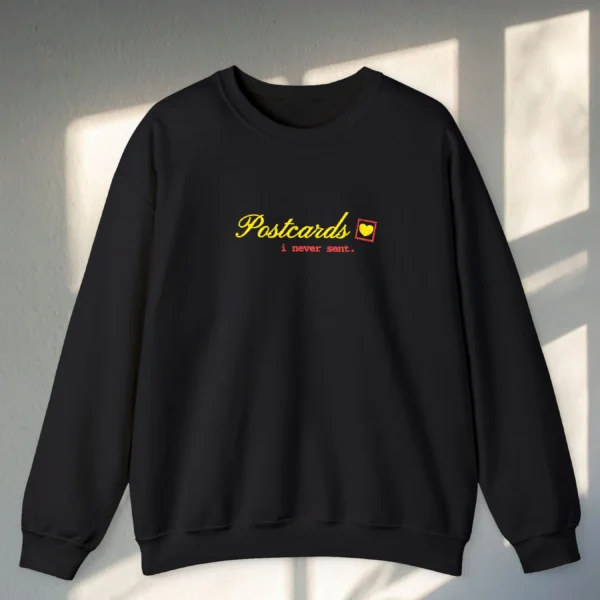 Postcards I Never Sent embroidered Gildan 18000 sweatshirt by Bhoomkins - Black Flatlay