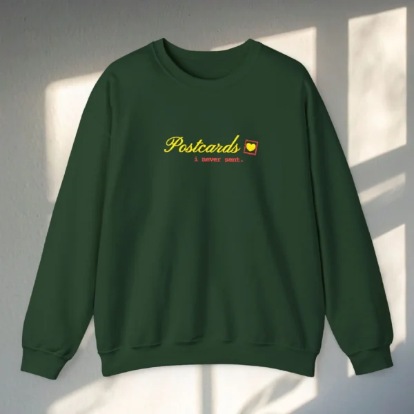 Postcards I Never Sent embroidered Gildan 18000 sweatshirt by Bhoomkins - Forest Green Flatlay