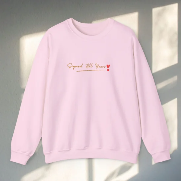 Signed, Still Yours embroidered Gildan 18000 sweatshirt by Bhoomkins - Light Pink Flatlay