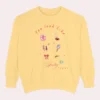 Sweatshirt with “You Look Like Poetry Today” quote and soft illustrated aesthetic elements like perfume, lipstick, ribbons, and hearts - Butter Flatlay