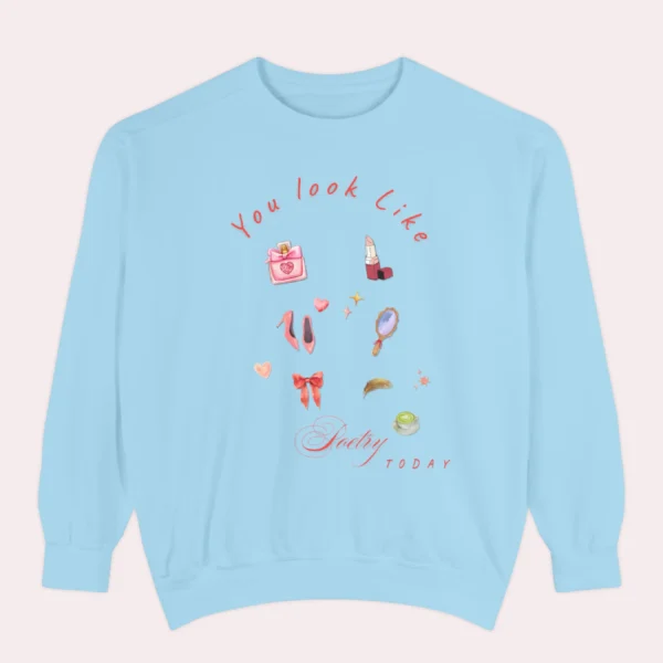 Sweatshirt with “You Look Like Poetry Today” quote and soft illustrated aesthetic elements like perfume, lipstick, ribbons, and hearts - Chambray Flatlay