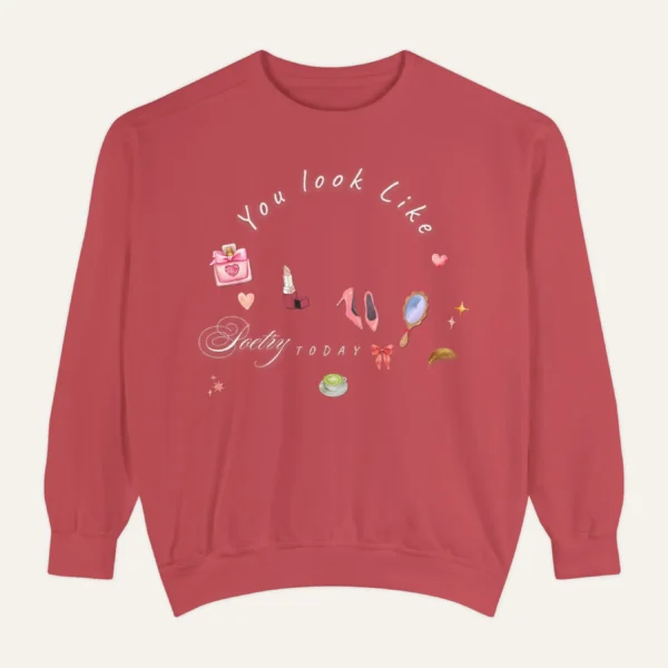 Sweatshirt with “You Look Like Poetry Today” quote and soft illustrated aesthetic elements like perfume, lipstick, ribbons, and hearts - Crimson Flatlay