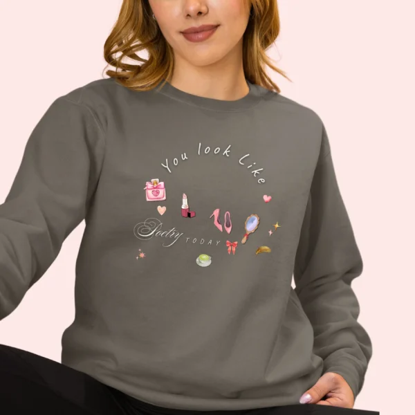 Sweatshirt with “You Look Like Poetry Today” quote and soft illustrated aesthetic elements like perfume, lipstick, ribbons, and hearts - Pepper